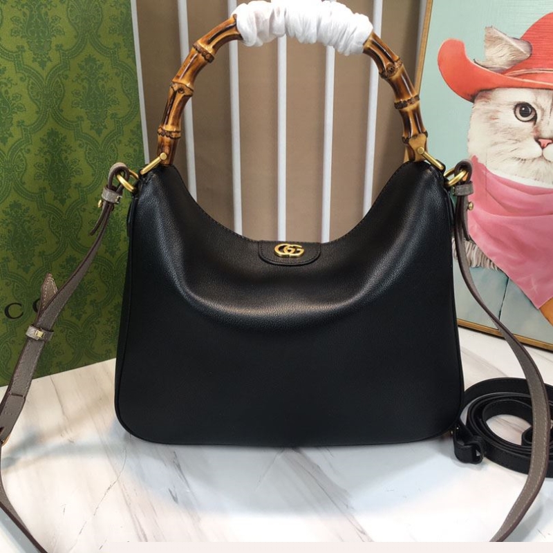 G*u*i top handle bags